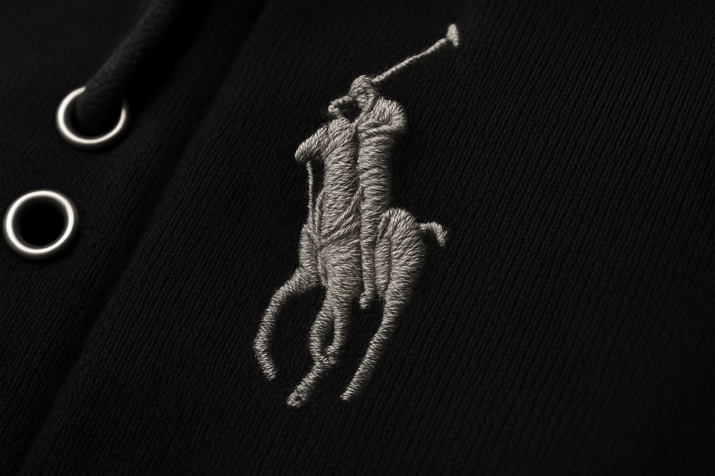 Detalle del logo - con ojales visibles