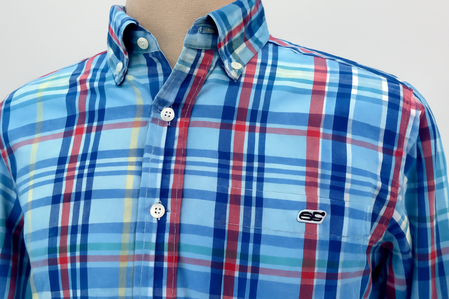 Detalle del logo y patrón repetido