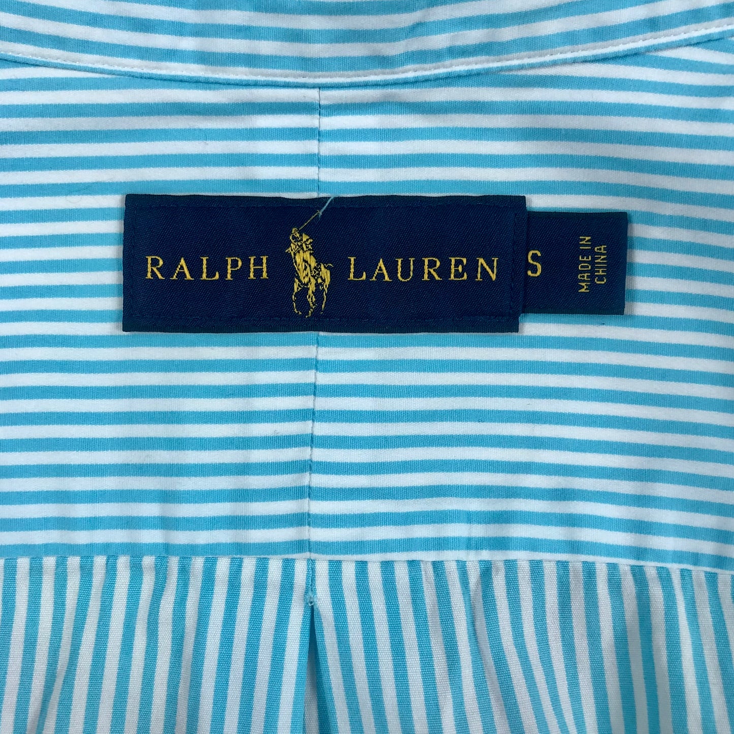 Camisa Polo Ralph Lauren 🏇🏼 Color blanco patron de rayas en color turquesa Talla S Entalle Regular