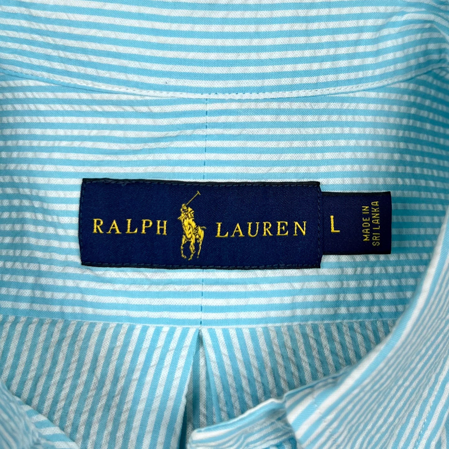 Camisa Polo Ralph Lauren 🏇🏼  Color blanco con patrón de rayas en turquesa Seersucker Talla L Entalle Regular
