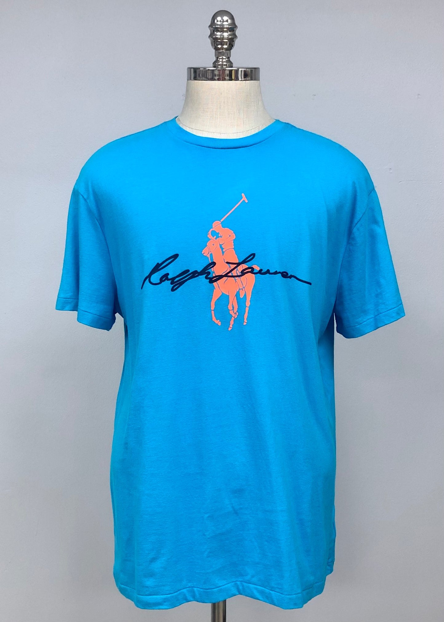 Camiseta cuello redondo Polo Ralph Lauren 🏇🏼 color azul con diseño de logo en naranja Talla Medium Entalle Clásico