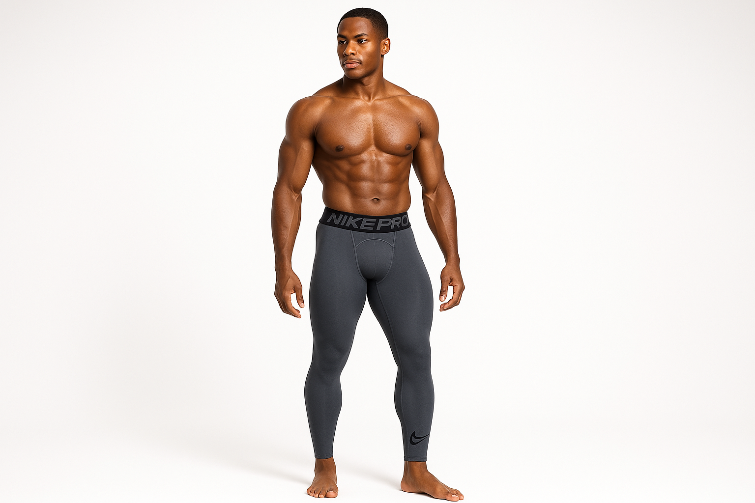 Mallas Nike Pro Dri-FIT - Modelo atlético con logo silueta en parte inferior