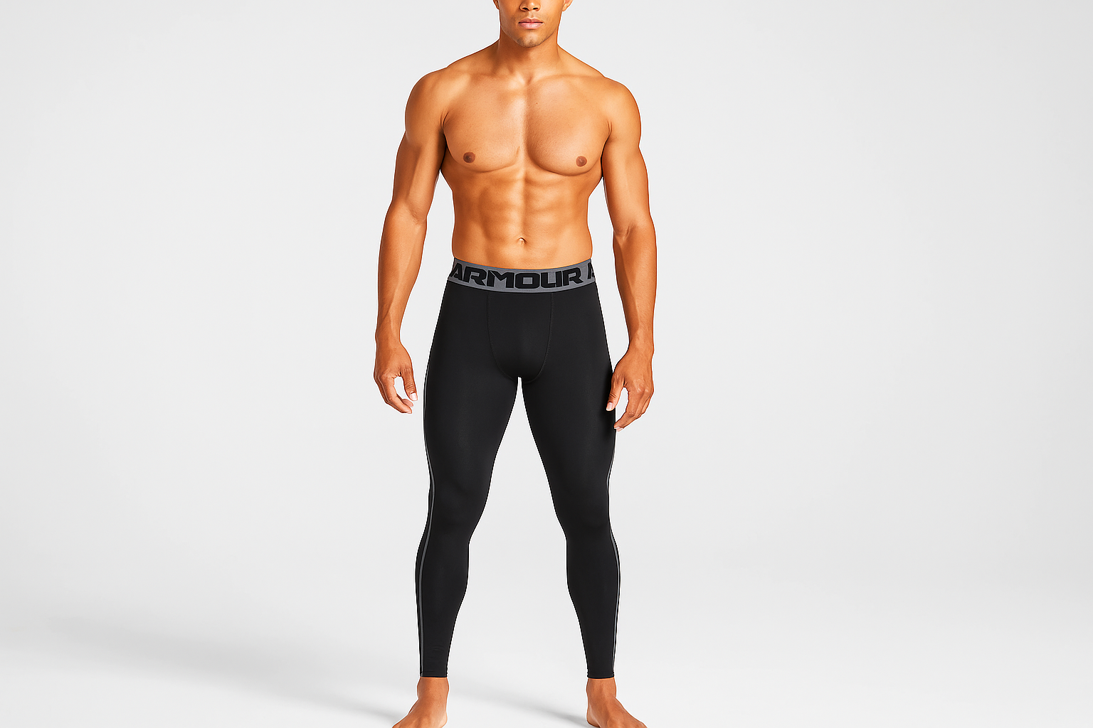 Mallas Under Armour HeatGear - Modelo atlético con logo atrás pierna derecha