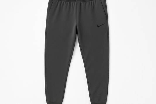 Pantalón Jogger Nike gris oscuro con logo pequeño y corte más amplio