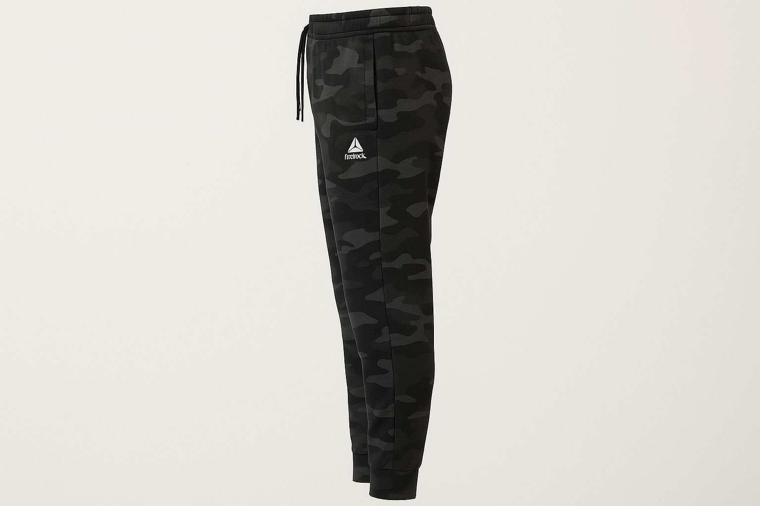 Pantalón Jogger Reebok camouflage con logo triángulo más pequeño - Vista lateral