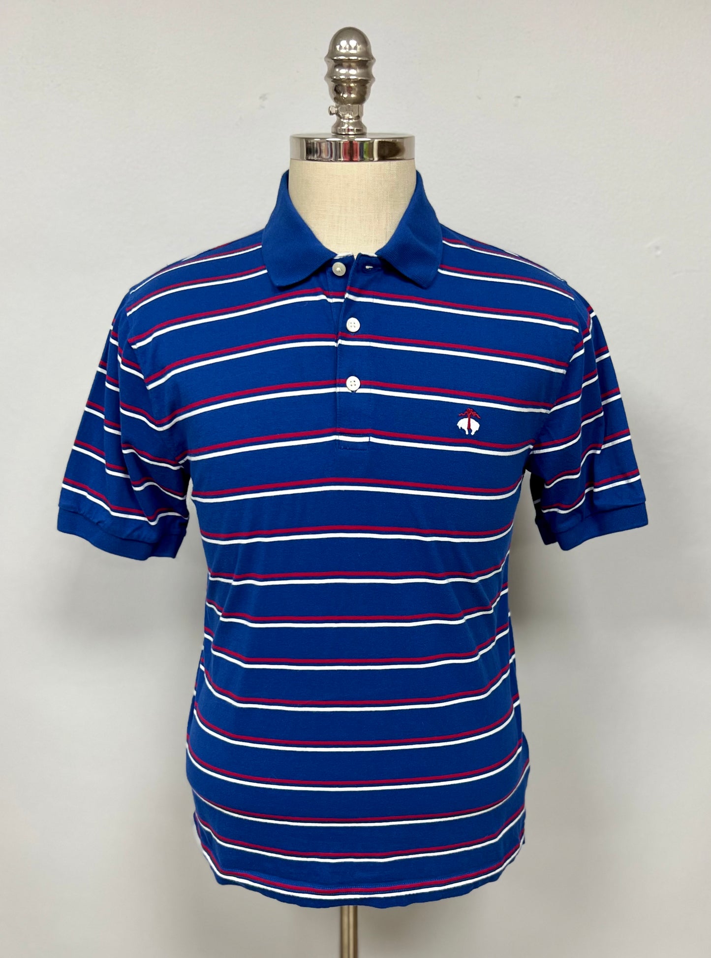 Camiseta Polo Brooks Brothers 🐑 color azul y patrón de rayas blancas y rojas Talla M Entalle Regular