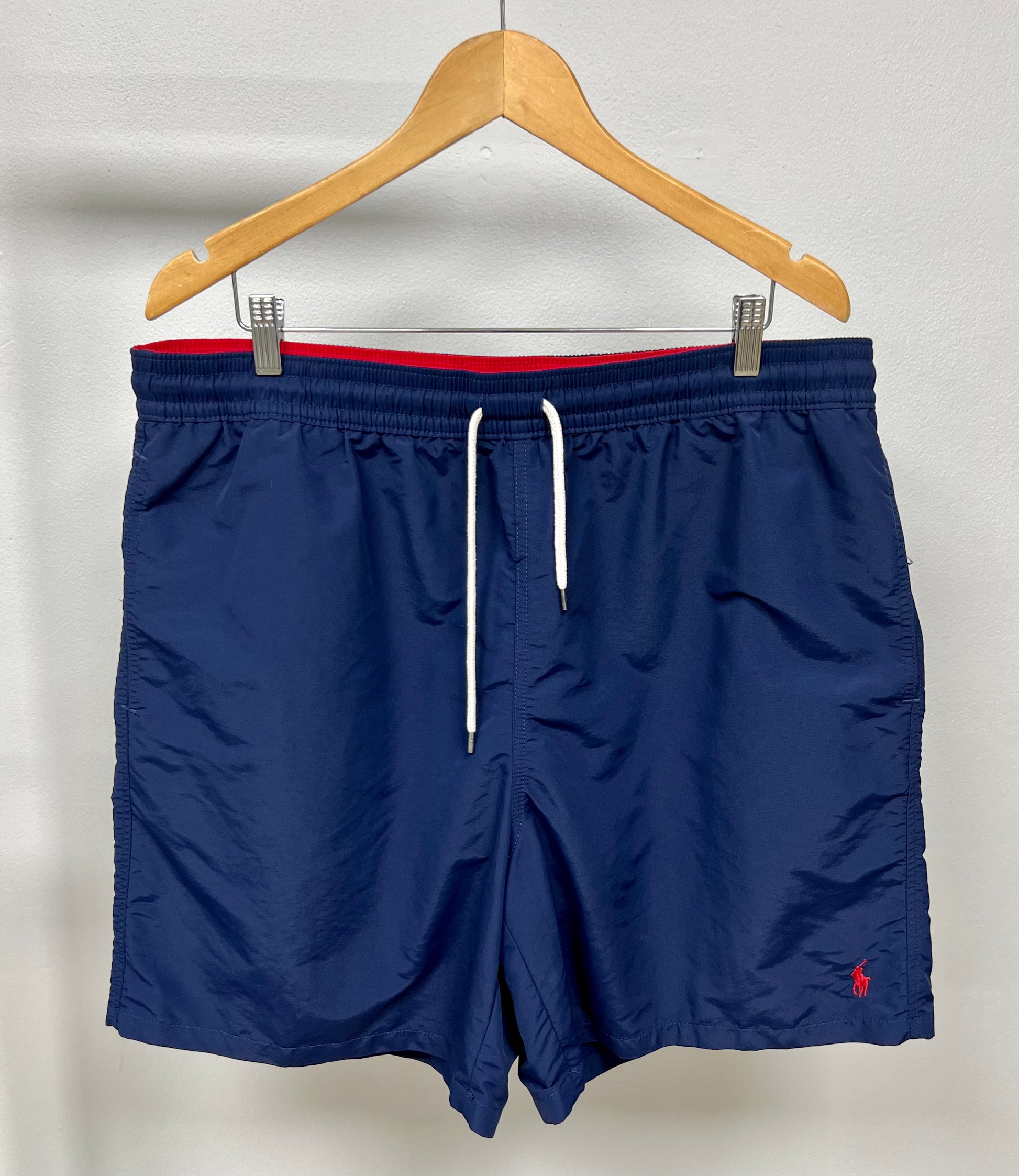 Short de outlet baño polo